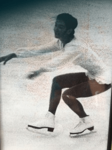 Sue-Ann Bubacz sit spin skating photo for writemixforbusiness.com